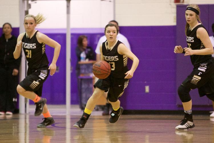 The Canon City Tigers defeated the Mesa Ridge Grizzlies 61-50 in girls' basketball on Tuesday, February 3, 2015 at Mesa Ridge High School. Photo by Isaiah J. Downing