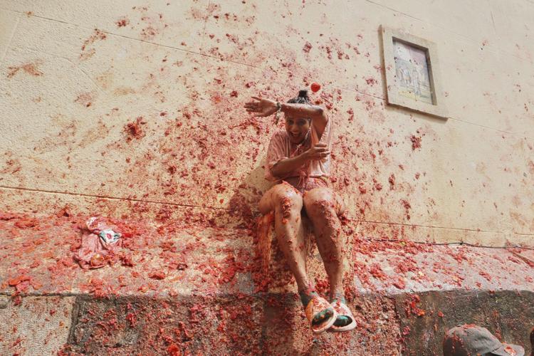 Tons of overripe tomatoes become projectiles in Spain #39 s Tomatina food