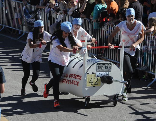Thousands flocked to Manitou Springs on Saturday, October 25, 2014, for the annual Emma Crawford Coffin Races. The races started in 1995, but the story of Emma Crawford goes back to 1891 when she was buried at the top of Red Mountain above Manitou Sprin...