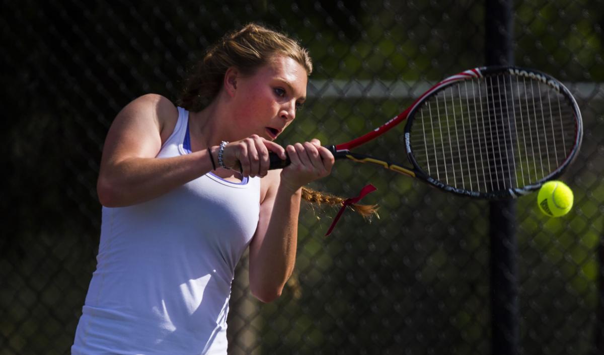 Cheyenne Mountain’s Taylor Heinicke returns a volley during the No. 2 Doubles finals Saturday, May 13, 2017, at the 4A State Tennis Championships in Pueblo. Cheyenne Mountain’s Arianna Arenson and Taylor Heinicke defeated Palmer Ridge’s Bali Fitzpatrick and Ciara Bobak 6-4, 6-1. (The Gazette, Christian Murdock)