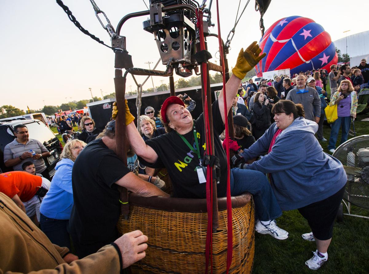 Incognito pilot Barbara Huhn prepares to lift off Saturday, Sept. 2, 2017, during the Colorado Springs Labor Day Lift Off in Memorial Park. The balloon festival runs through Monday morning. (The Gazette, Christian Murdock)