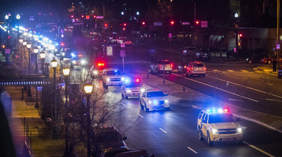 Hundreds of public safety vehicles follow the hearse carrying the body of slain El Paso County sheriff's deputy Micah Flick down Nevada Avenue Monday night, Feb. 5, 2018. The 34-year-old deputy was killed earlier in the day while investigating a stolen vehicle. (The Gazette, Christian Murdock)