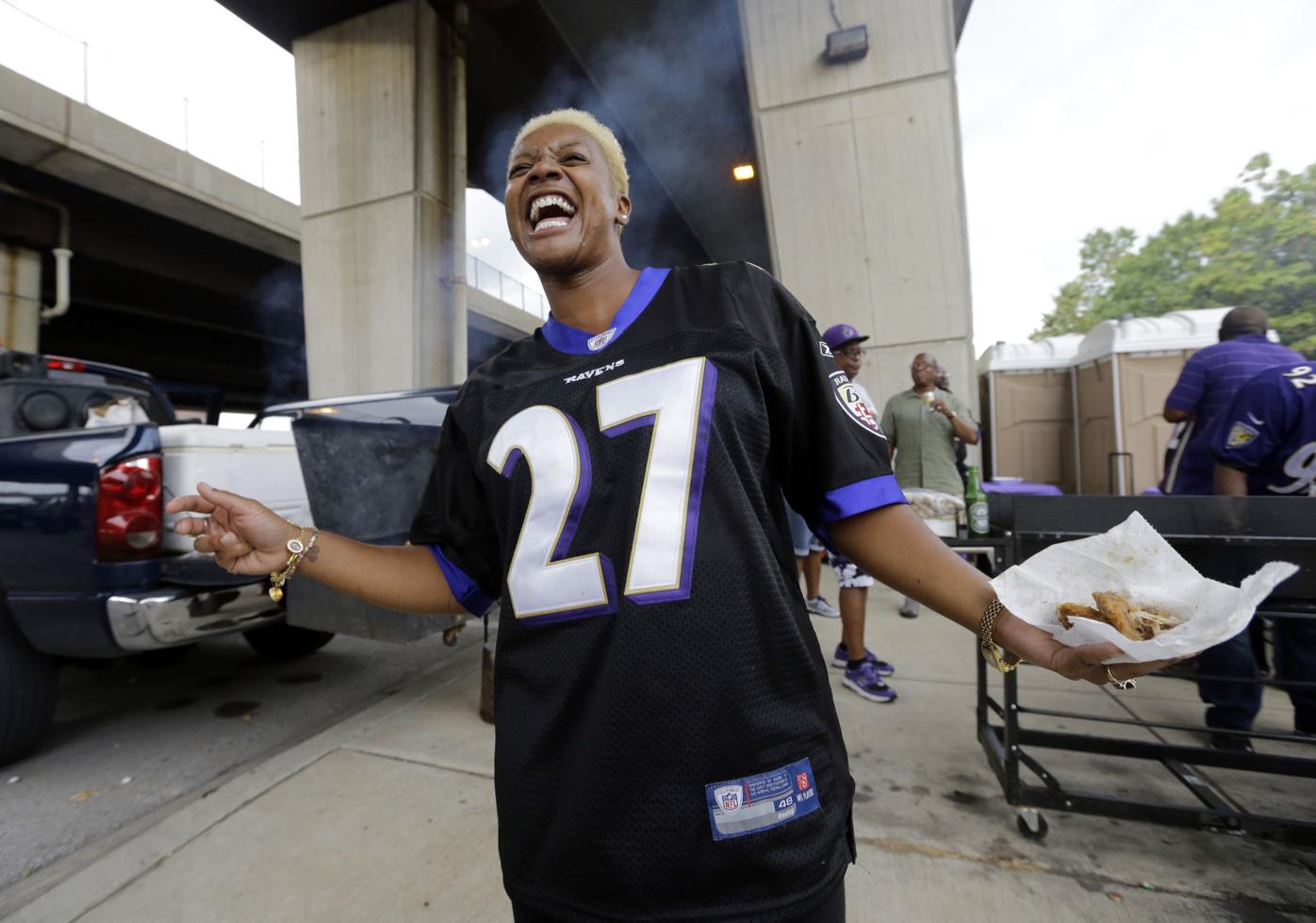 Ravens fans, men and women, wear No 27 for Rice, Sports