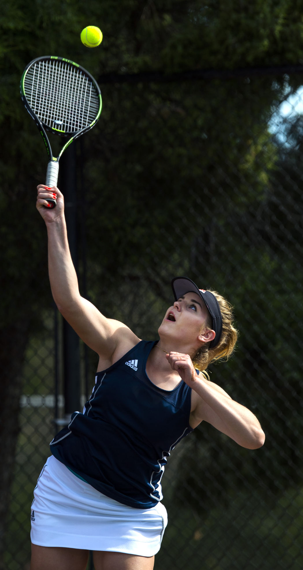 Palmer Ridge’s Ciara Bobak serves during the No. 2 Doubles finals Saturday, May 13, 2017, at the 4A State Tennis Championships in Pueblo. Cheyenne Mountain’s Arianna Arenson and Taylor Heinicke defeated Palmer Ridge’s Bali Fitzpatrick and Ciara Bobak 6-4, 6-1. (The Gazette, Christian Murdock)