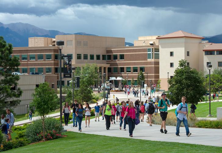 Students walk on the University of Colorado at Colorado Springs campus Thursday, Aug. 28, 2014 during their first week of the fall semester. Enrollment at the Colorado Springs university has increased 40 percent over the last decade to 11,199. (The Gaze...