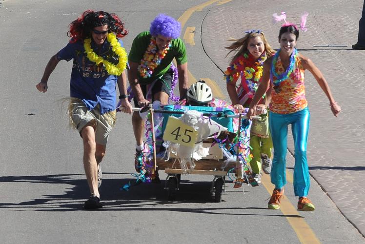 Thousands flocked to Manitou Springs on Saturday, October 25, 2014, for the annual Emma Crawford Coffin Races. The races started in 1995, but the story of Emma Crawford goes back to 1891 when she was buried at the top of Red Mountain above Manitou Sprin...