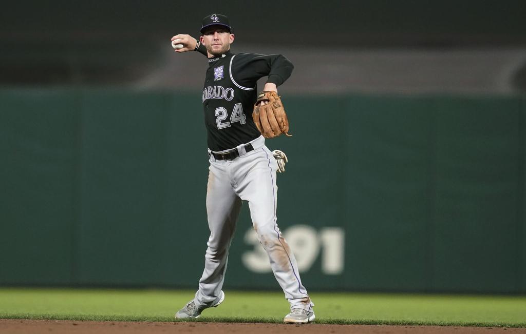 Rockies' Ryan McMahon, once a 'terrible' defender, now a Gold Glove  candidate, Sports