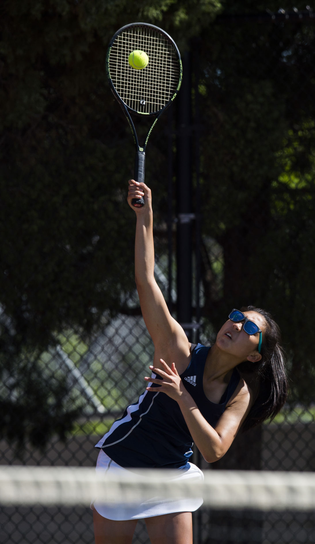 Palmer Ridge’s Regina Park serves against Cheyenne Mountain’s Katie Nelson and Jensen Enterman during the No.3 doubles finals Saturday, May 13, 2017, at the 4A State Tennis Championships in Pueblo. Cheyenne Mountain’s Katie Nelson and Jensen Enterman defeated Palmer Ridge’s Cailin Foster and Regina Park 6-0, 6-3. (The Gazette, Christian Murdock)
