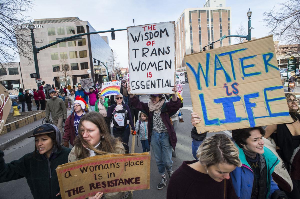 Protesters march down Tejon Street Saturday, Jan. 21, 2017, during the Colorado Springs Women's March in downtown Colorado Springs. The sister march of the Women's March on Washington, D.C., drew between 5,000 and 10,000 people. (The Gazette, Christian Murdock)