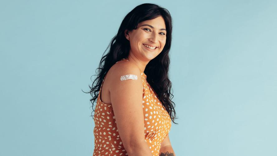 Woman with bandage on arm
