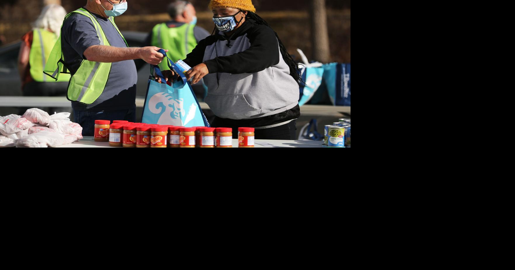 PHOTOS 38th annual Bob Telmosse Christmas Giveaway turns to drive thru