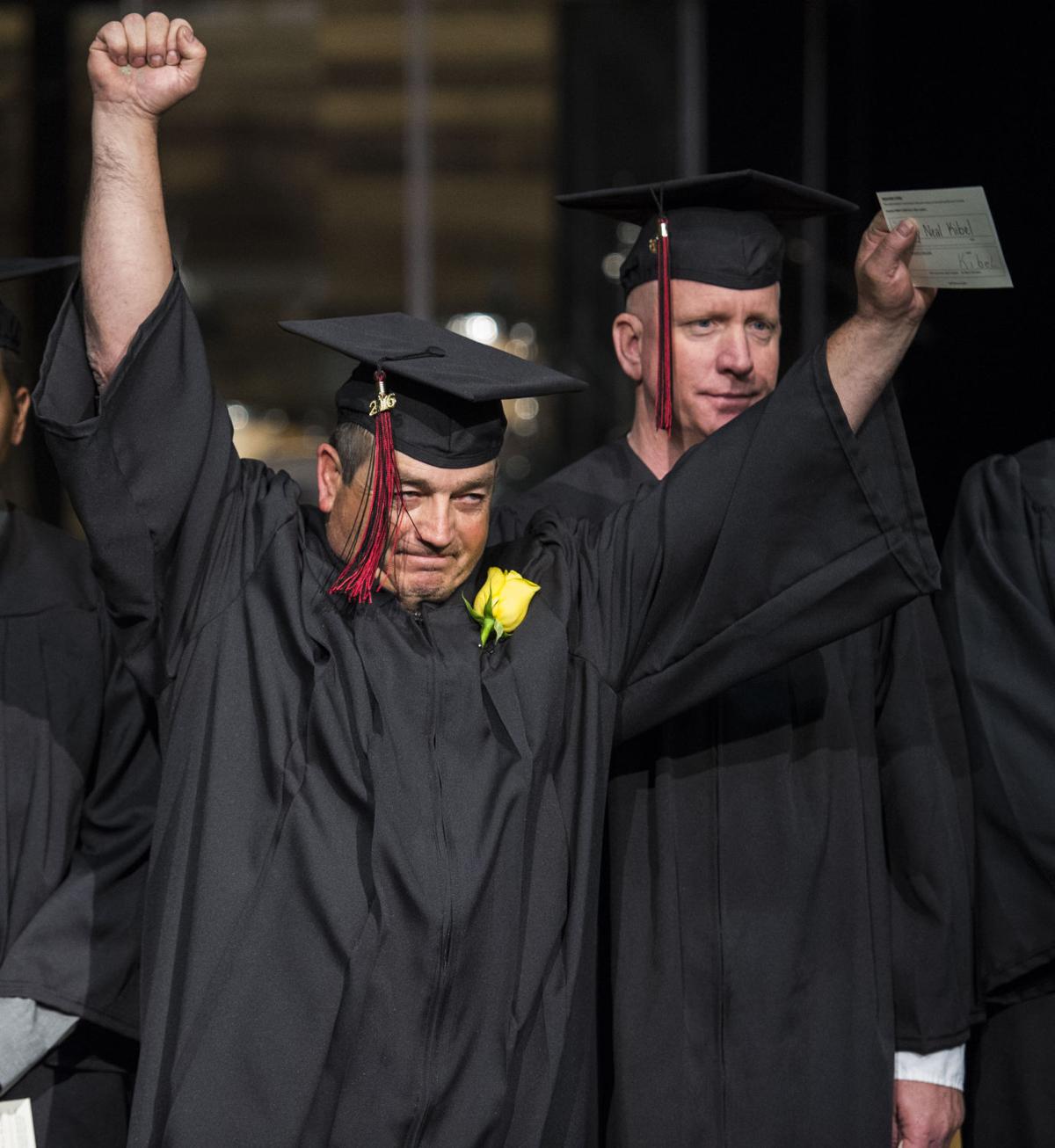Ted Kibel celebrates as he and other veterans were honored before the graduation ceremony for the Pikes Peak Community College class of 2016 at New LIfe Church May, 14, 2016. Kibel served in the U.S. Army from 1985 to 2012. The Gazette, Christian Murdock)