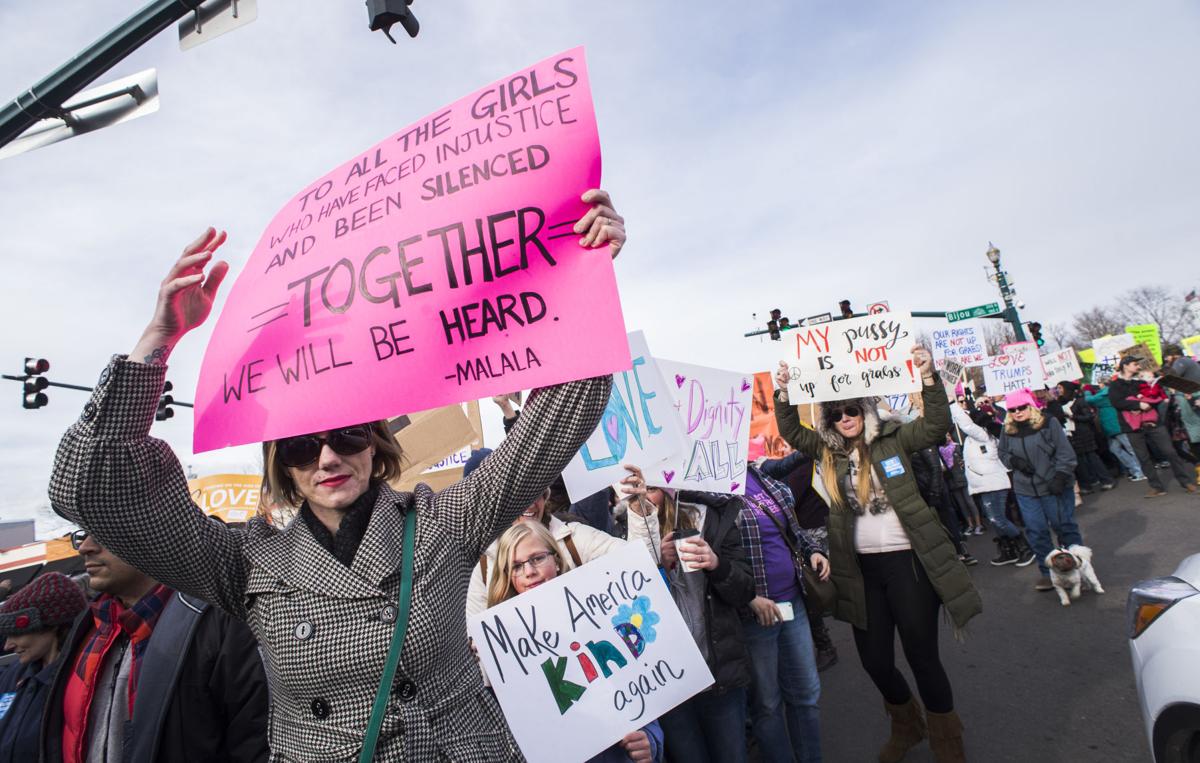 Protesters march down Tejon Street Saturday, Jan. 21, 2017, during the Colorado Springs Women's March in downtown Colorado Springs. The sister march of the Women's March on Washington, D.C., drew between 5,000 and 10,000 people. (The Gazette, Christian Murdock)