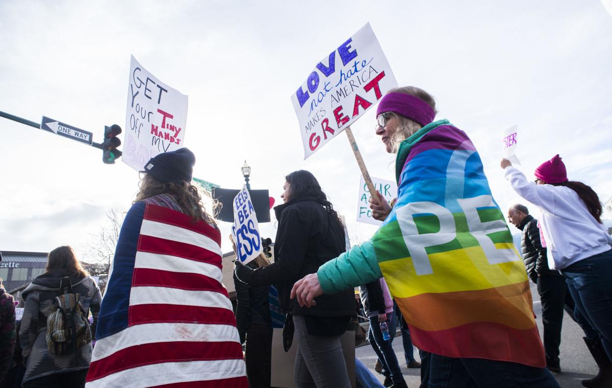 Protesters march down Tejon Street Saturday, Jan. 21, 2017, during the Colorado Springs Women's March in downtown Colorado Springs. The sister march of the Women's March on Washington, D.C., drew between 5,000 and 10,000 people. (The Gazette, Christian Murdock)