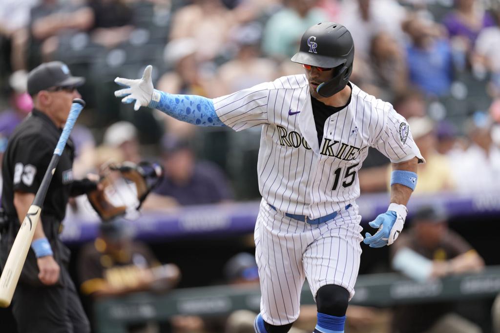 Rockies hit 3 home runs to beat winless Padres 7-4