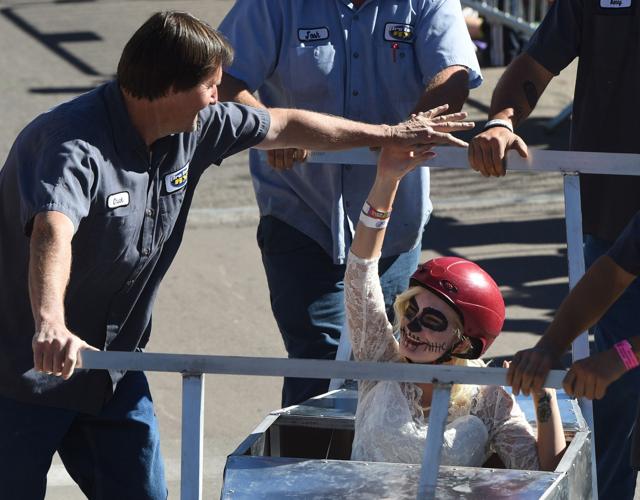 Thousands flocked to Manitou Springs on Saturday, October 25, 2014, for the annual Emma Crawford Coffin Races. The races started in 1995, but the story of Emma Crawford goes back to 1891 when she was buried at the top of Red Mountain above Manitou Sprin...