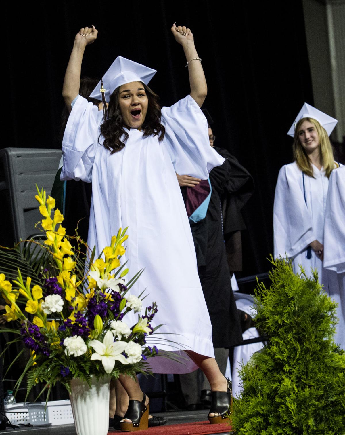 Avad Stahl-Gomez celebrates after her name was called during the Palmer Class of 2017 graduation ceremony Tuesday, May 23, 2017, at the Boardmoor World Arena in Colorado Springs. (The Gazette, Christian Murdock)