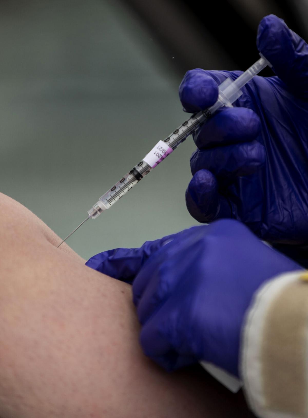 Scenes from a drive-thru COVID-19 vaccination clinic