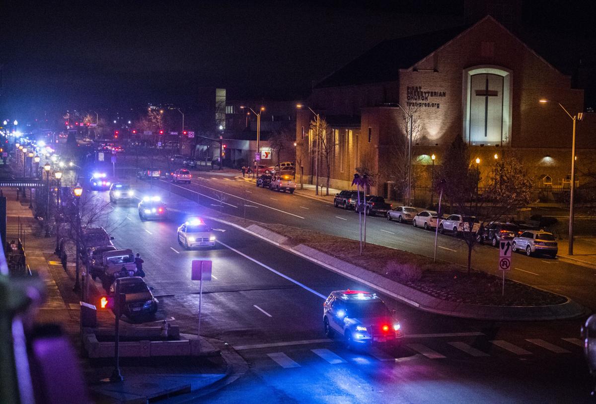 Hundreds of public safety vehicles follow the hearse carrying the body of slain El Paso County sheriff's deputy Micah Flick down Nevada Avenue Monday night, Feb. 5, 2018. The 34-year-old deputy was killed earlier in the day while investigating a stolen vehicle. (The Gazette, Christian Murdock)