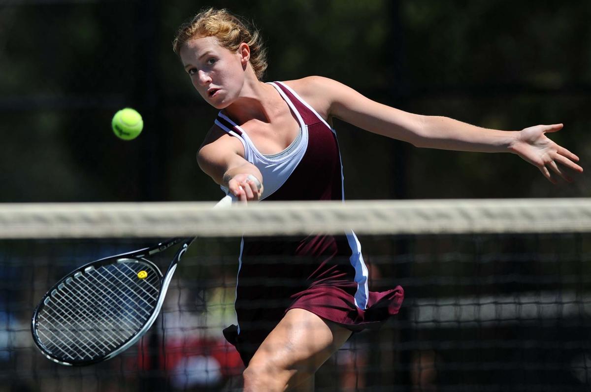 Cheyenne Mountain's Frances Adams returns a volley during the No.1 doubles match between Peak to Peak's Brittany Guidetti and Jenny Seo and Adams and her partner Caroline Kingo Thursday, May 10, 2012, during the first round of the Stage 4A Girls' Tennis Championships at Pueblo City Park. The Cheyenne Mountain team won 6-2,6-1. (The Gazette, Christian Murdock)