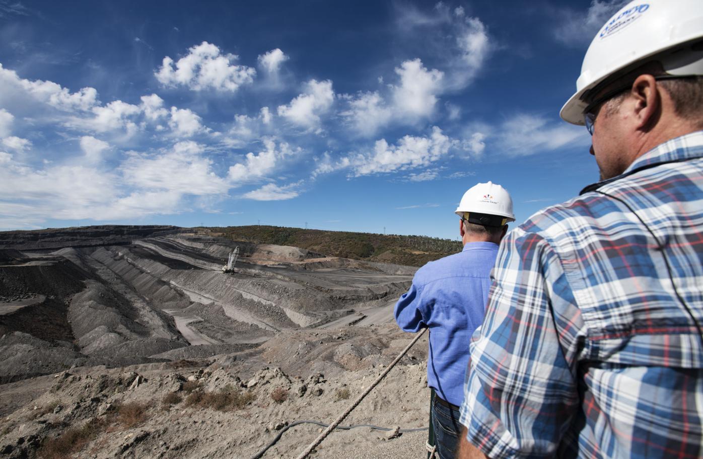 Premium Photo  Miners working deep inside a coal mine facility