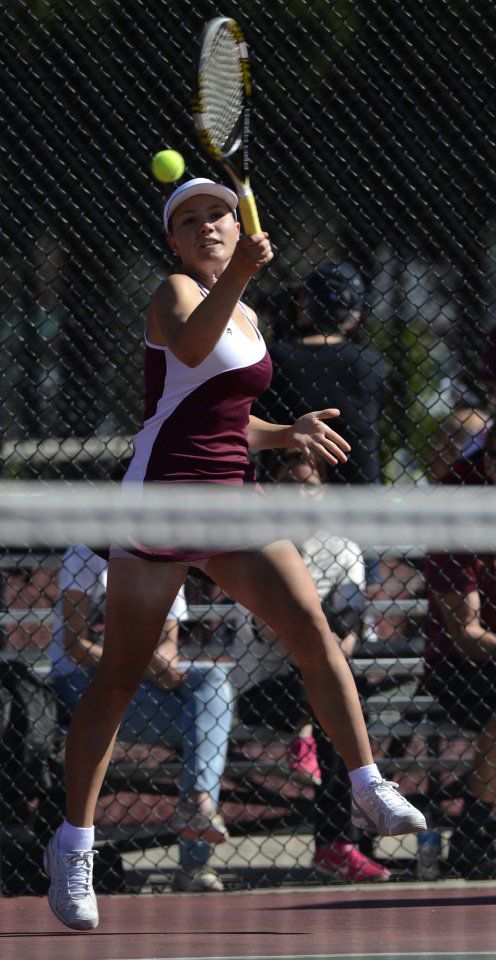 Cheyenne Mountain's Daiella Adamczyk returns a shot against Kent Denver's Delaney Nalen during the No. 2 singles final Saturday, May 10, 2014, at the Colorado 4A girls state tennis championships finals at City Park in Pueblo. Nalen won 6-3, 6-3. (The Gazette, Christian Murdock)