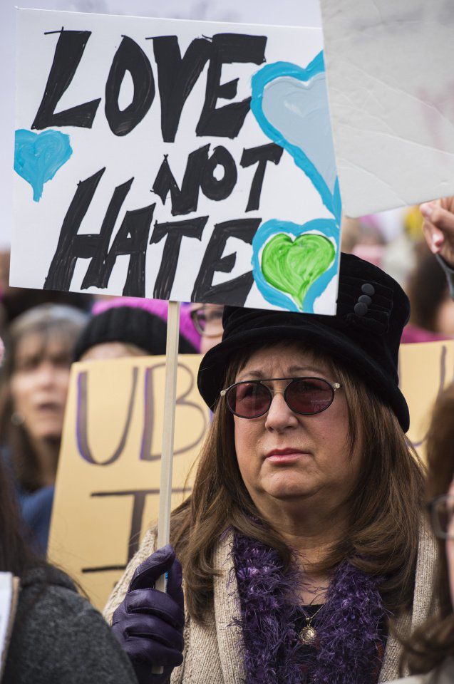 Protesters listen to speakers in Acacia Park Saturday, Jan. 21, 2017, before marching down Tejon Street during the Colorado Springs Women's March in downtown Colorado Springs. The sister march of the Women's March on Washington, D.C., drew between 5,000 and 10,000 people. (The Gazette, Christian Murdock)