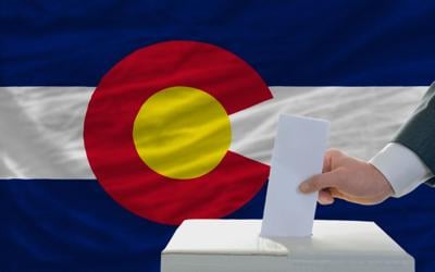 elections in front US state flag of colorado