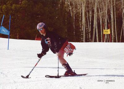 John Papai of Woodland Park skis with one leg