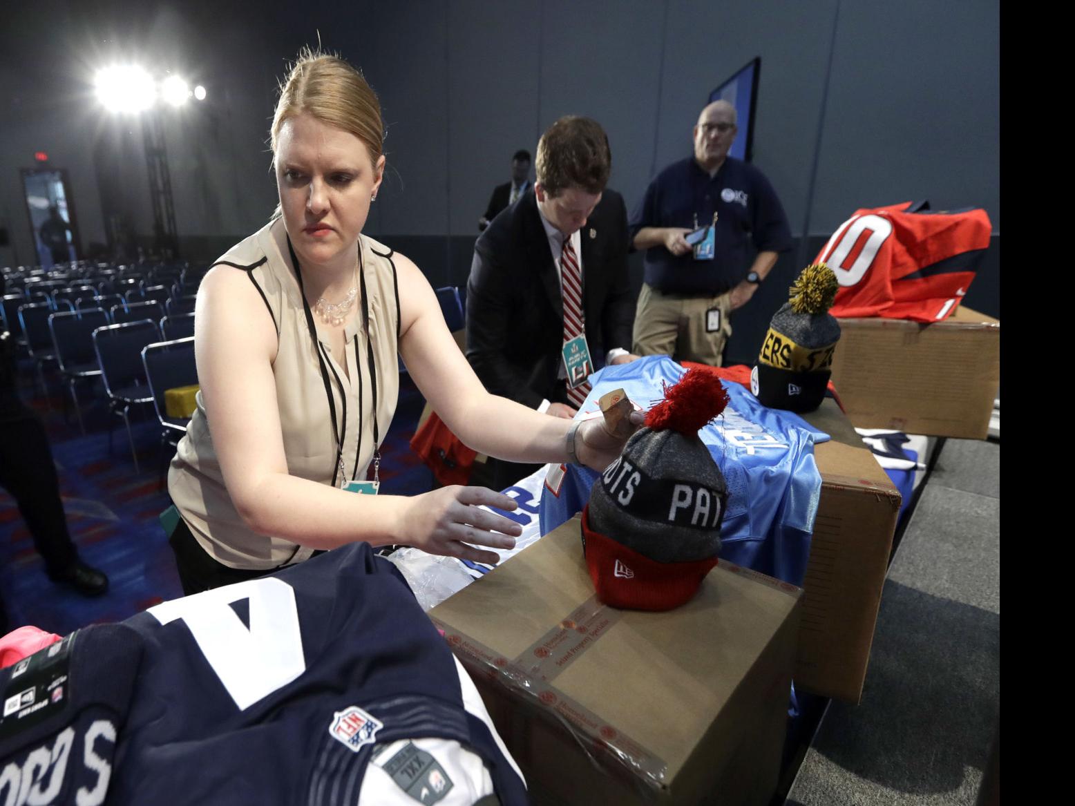 Law enforcement crack down on counterfeit Super Bowl merchandise