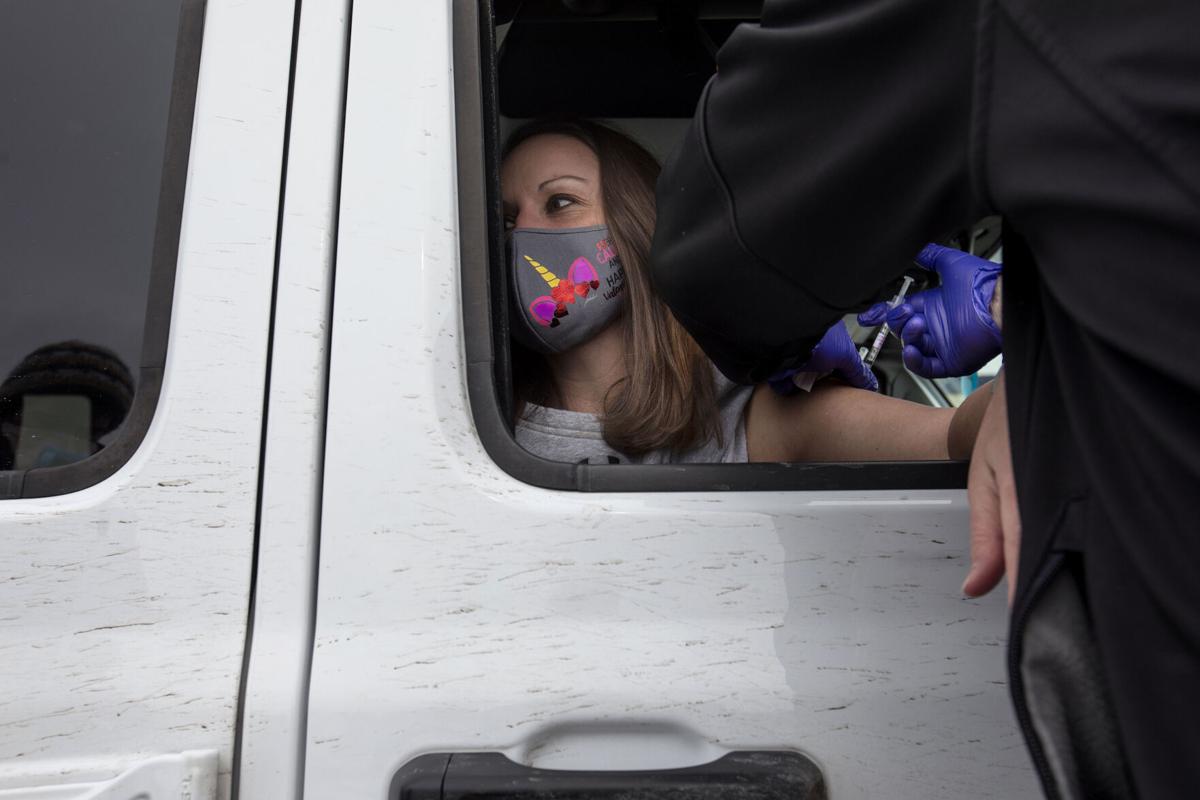 Scenes from a drive-thru COVID-19 vaccination clinic