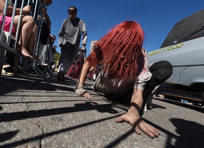 Thousands flocked to Manitou Springs on Saturday, October 25, 2014, for the annual Emma Crawford Coffin Races. The races started in 1995, but the story of Emma Crawford goes back to 1891 when she was buried at the top of Red Mountain above Manitou Sprin...