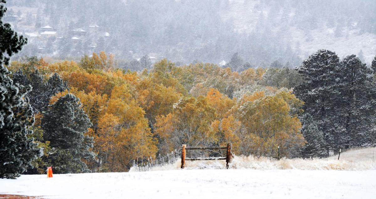 Colorado Springs First Fall Snow Packs A Punch Leaves Freezing