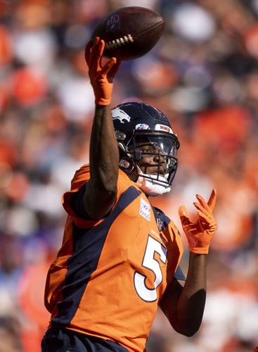 Broncos overcome Teddy Bridgewater's injury with stiff defense to