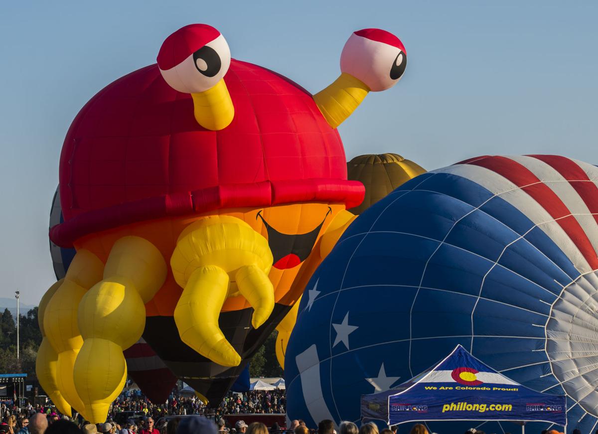 Balloons begin to fill the field at Memorial Park as the second wave prepares to lift off Saturday, Sept. 2, 2017, during the Colorado Springs Labor Day Lift Off. The balloon festival runs through Monday morning. (The Gazette, Christian Murdock)