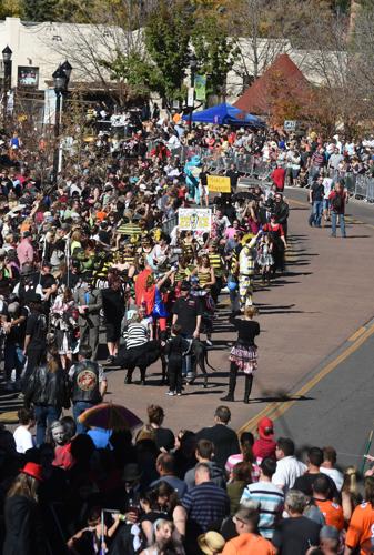 Thousands flocked to Manitou Springs on Saturday, October 25, 2014, for the annual Emma Crawford Coffin Races. The races started in 1995, but the story of Emma Crawford goes back to 1891 when she was buried at the top of Red Mountain above Manitou Sprin...