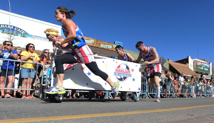 Thousands flocked to Manitou Springs on Saturday, October 25, 2014, for the annual Emma Crawford Coffin Races. The races started in 1995, but the story of Emma Crawford goes back to 1891 when she was buried at the top of Red Mountain above Manitou Sprin...