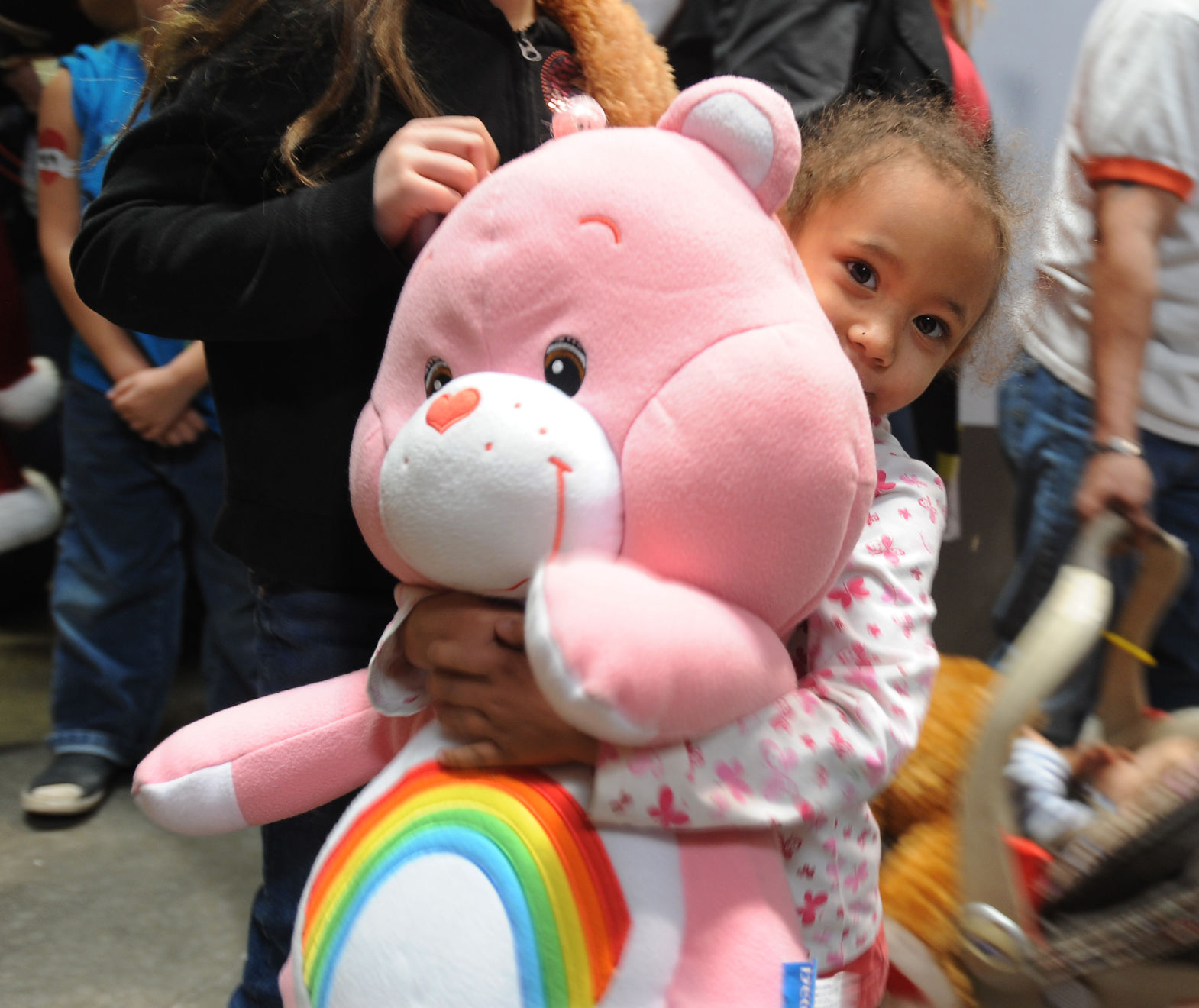 stuffed animals feed a child