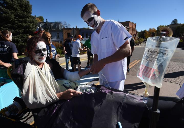 Thousands flocked to Manitou Springs on Saturday, October 25, 2014, for the annual Emma Crawford Coffin Races. The races started in 1995, but the story of Emma Crawford goes back to 1891 when she was buried at the top of Red Mountain above Manitou Sprin...