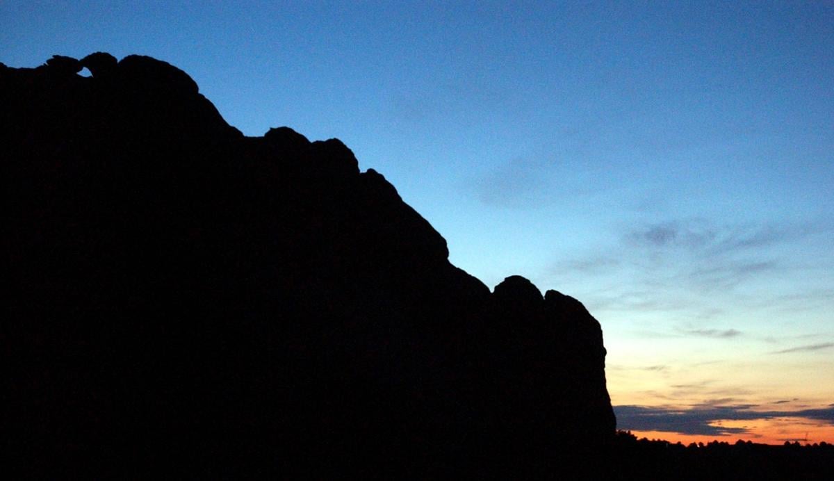 The kissing camels at Garden of the Gods await the sun rise and approximately 150 people to gather for the unofficial 84th annual Easter Sunrise Service at Garden of the Gods on Sunday, April 20, 2003. Approximately 150 people gather for the unofficial 84th annual Easter Sunrise Service at Garden of the Gods on Sunday, April 20, 2003. The service was officially canceled this year due to the cost of putting the event on. Most of the people who showed up this year were members of New Life Church. They gathered to worship through song and prayer. Photo by David Bitton