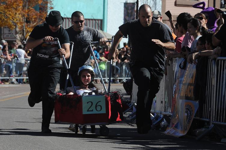 Thousands flocked to Manitou Springs on Saturday, October 25, 2014, for the annual Emma Crawford Coffin Races. The races started in 1995, but the story of Emma Crawford goes back to 1891 when she was buried at the top of Red Mountain above Manitou Sprin...