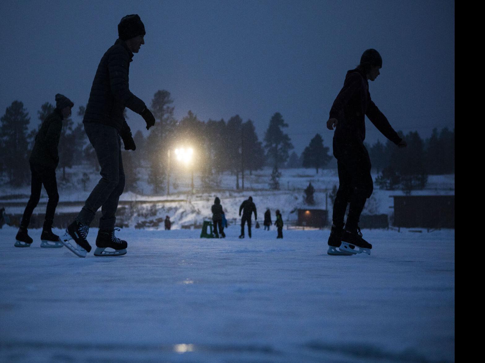 Hundred of people started the new year with a plunge into the frozen  Evergreen Lake