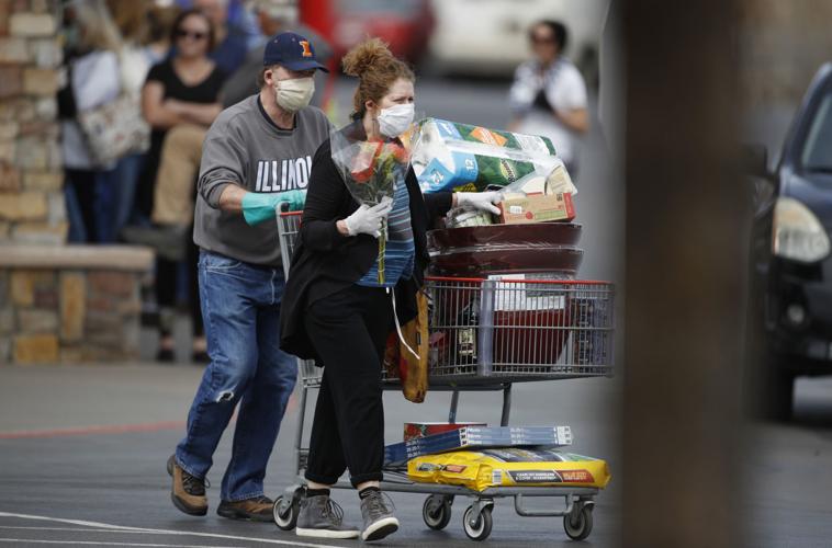 Colorado buys millions of masks, gloves as virus surge nears