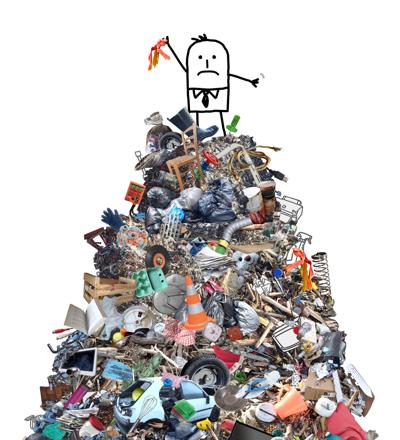 Man on Mountain of clutter-Dreamstime.jpg