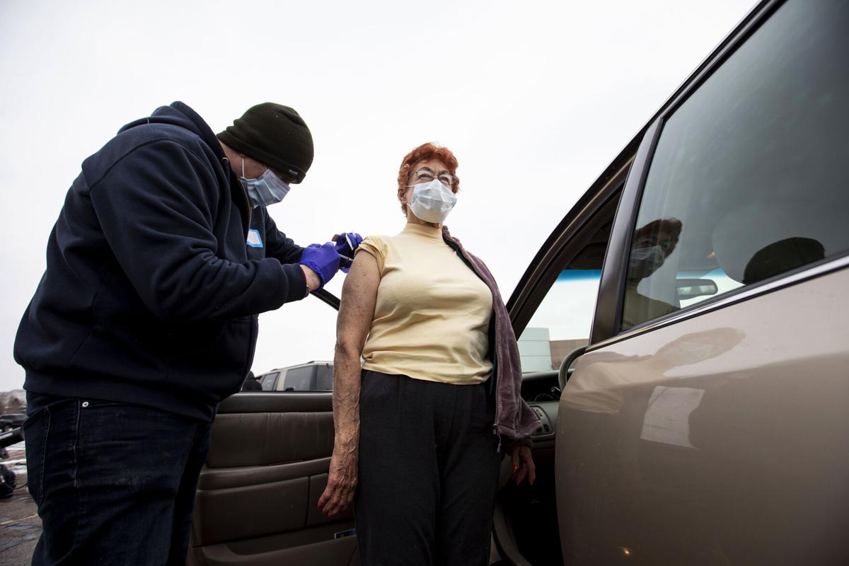 Scenes from a drive-thru COVID-19 vaccination clinic