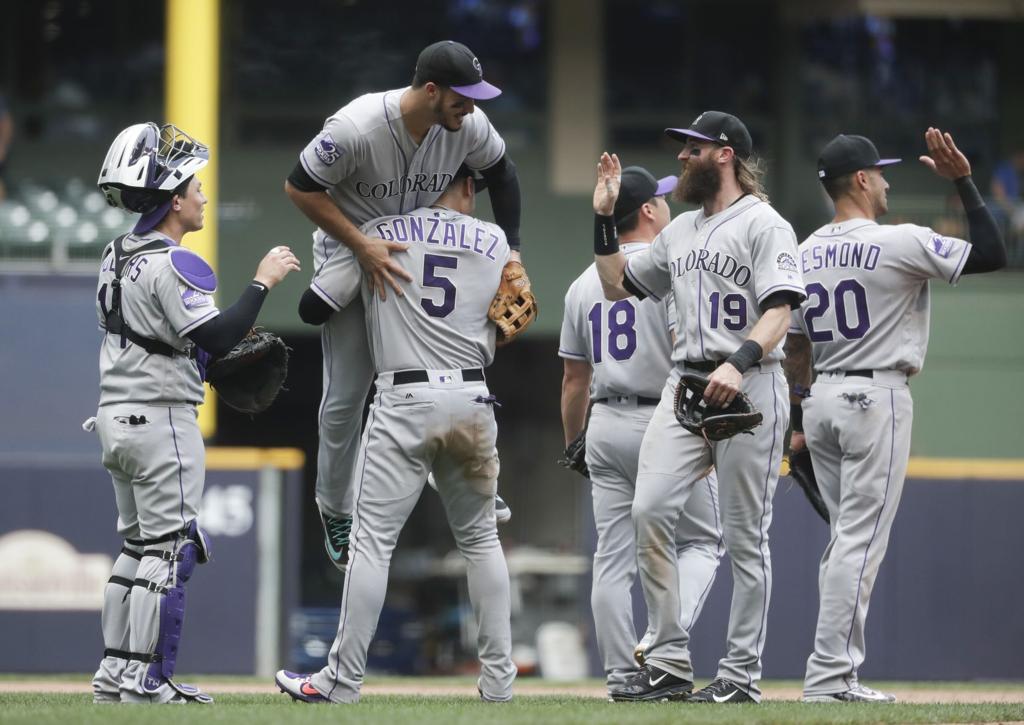 Denver CO, USA. 17th July, 2021. Los Angeles right fielder A.J. Pollock  (11) hits a home run during the game with the Los Angeles Dodgers and the  Colorado Rockies held at Coors