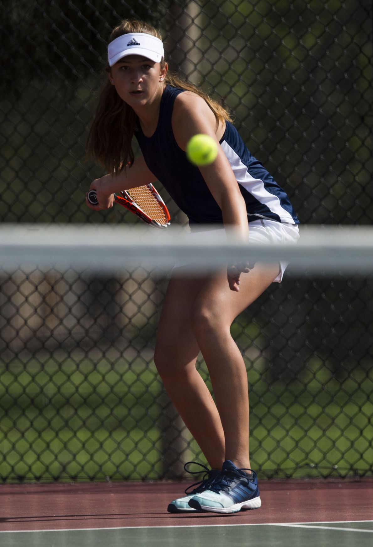 Palmer Ridge’s Bali Fitzpatrick returns a volley during the No. 2 Doubles finals Saturday, May 13, 2017, at the 4A State Tennis Championships in Pueblo. Cheyenne Mountain’s Arianna Arenson and Taylor Heinicke defeated Palmer Ridge’s Bali Fitzpatrick and Ciara Bobak 6-4, 6-1. (The Gazette, Christian Murdock)