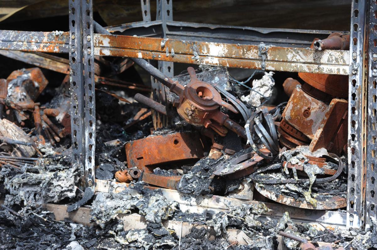 The machinery in the workshop of Paul Vanslyke on Porcupine Ln. lays in ruins. Homeowners that are north of Burgess Rd. and east of Vollmer Rd. in the Black Forest burn area were able to return to their homes today on Tuesday, June 18, 2013.(Jerilee Bennett/The Gazette)