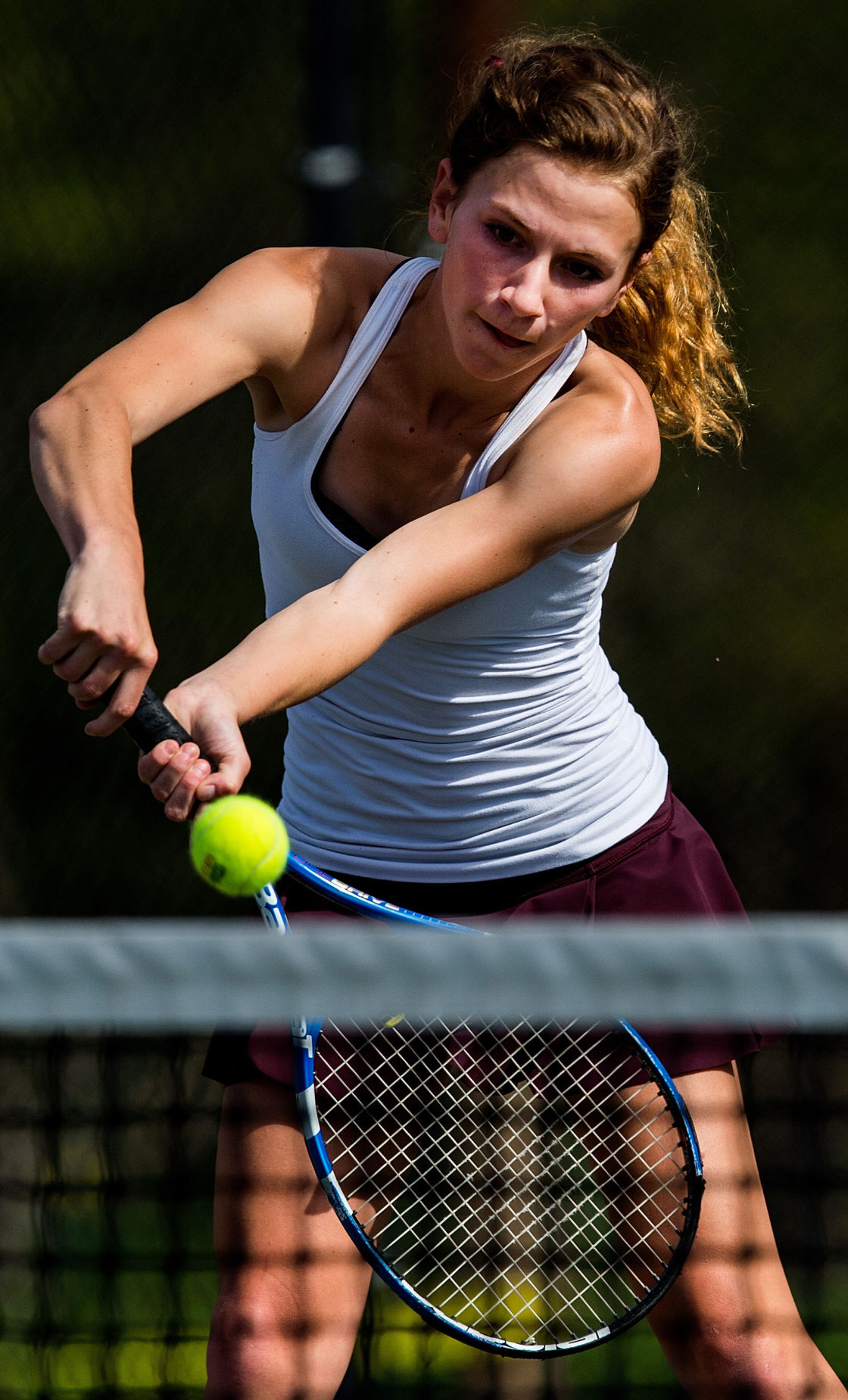 Cheyenne Mountain’s Ally Arenson returns a volley in the No. 1 Doubles finals Saturday, May 13, 2017, at the 4A State Tennis Championships in Pueblo. Arenson and her partner, Casey Ahrendsen won their fourth straight No. 1 Doubles title with a 6-1, 6-2 win over Valor Christian’s Tiffany Parobek and Lucie Hosse. (The Gazette, Christian Murdock)