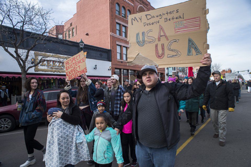 Protesters march down Tejon Street Saturday, Jan. 21, 2017, during the Colorado Springs Women's March in downtown Colorado Springs. The sister march of the Women's March on Washington, D.C., drew between 5,000 and 10,000 people. (The Gazette, Christian Murdock)